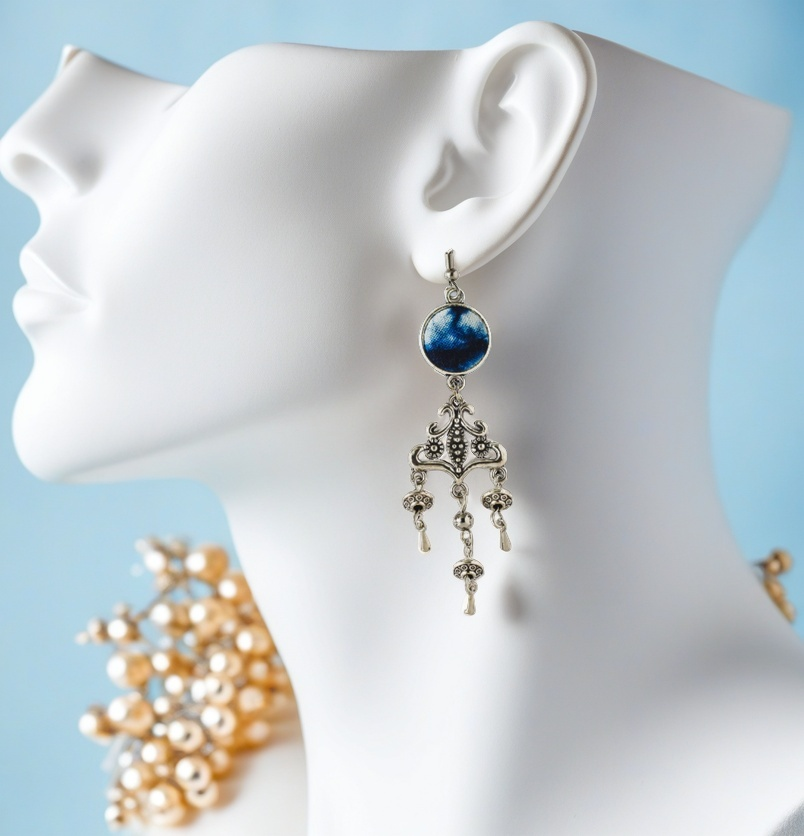 Handcrafted tie-dyed silver earrings in the style of a European castle