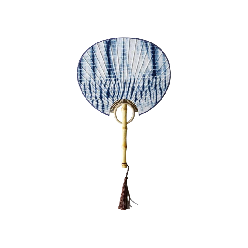 Handmade tie-dye fan with natural bamboo handle and flowing patterns on the surface.