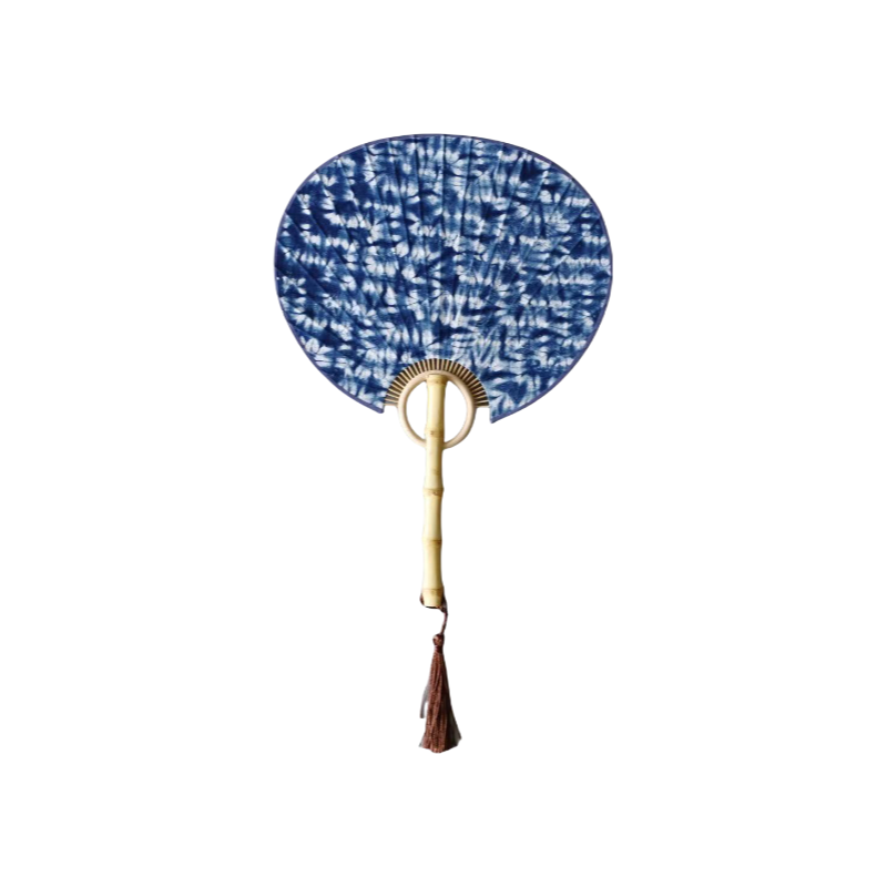 Handmade tie-dye fan with natural bamboo handle and arc-shaped patterns