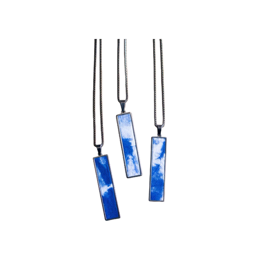 Handmade tie-dye long pendant with the pattern of blue sky and white clouds
