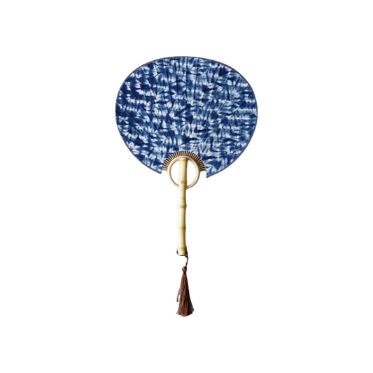 Handmade tie-dye fan with natural bamboo handle and arc-shaped patterns