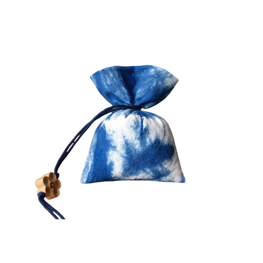 Handmade tie-dye sachets featuring patterns of blue sky and white clouds