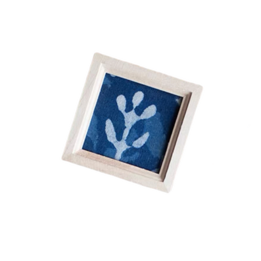 Handmade tie-dye woodblock-printed wooden fridge magnets featuring tree branches