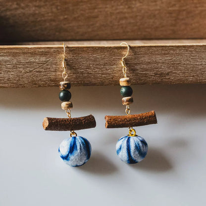 Handcrafted Chinese-style silver shaped beaded earrings in the shape of plants